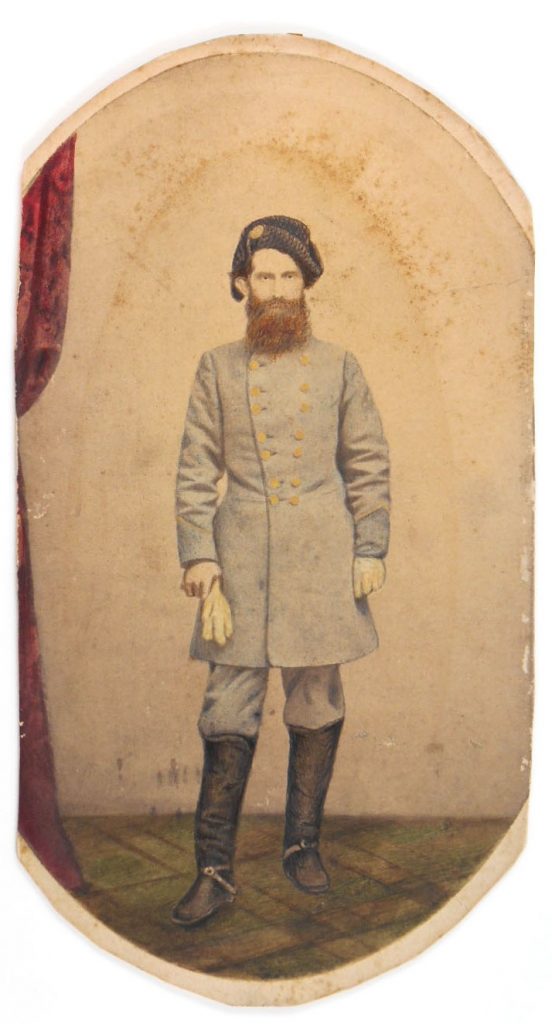 Portrait of Civil War soldier in uniform, wearing a hat. 