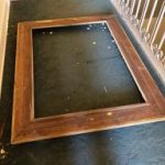 damaged frame on floor