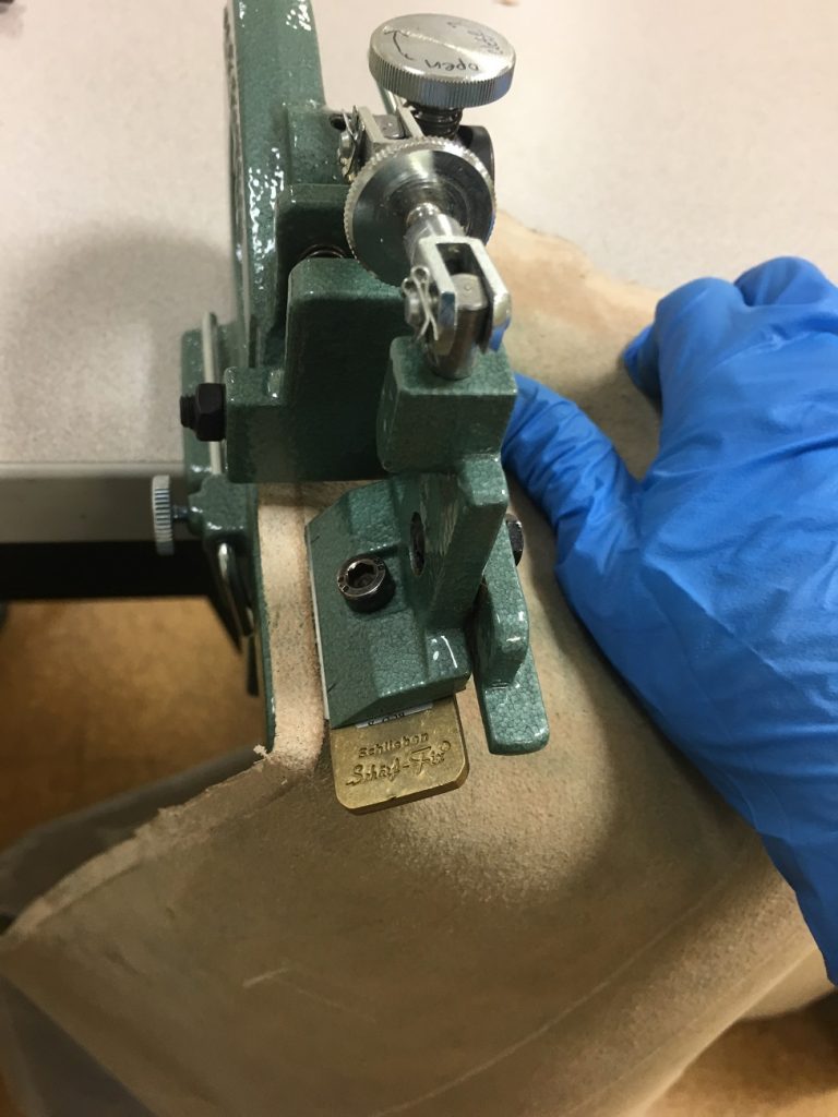 Leather in the Scharffix paring machine