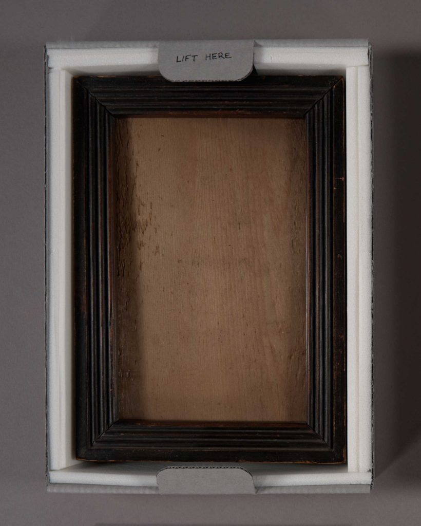 wooden frame in padded tray
