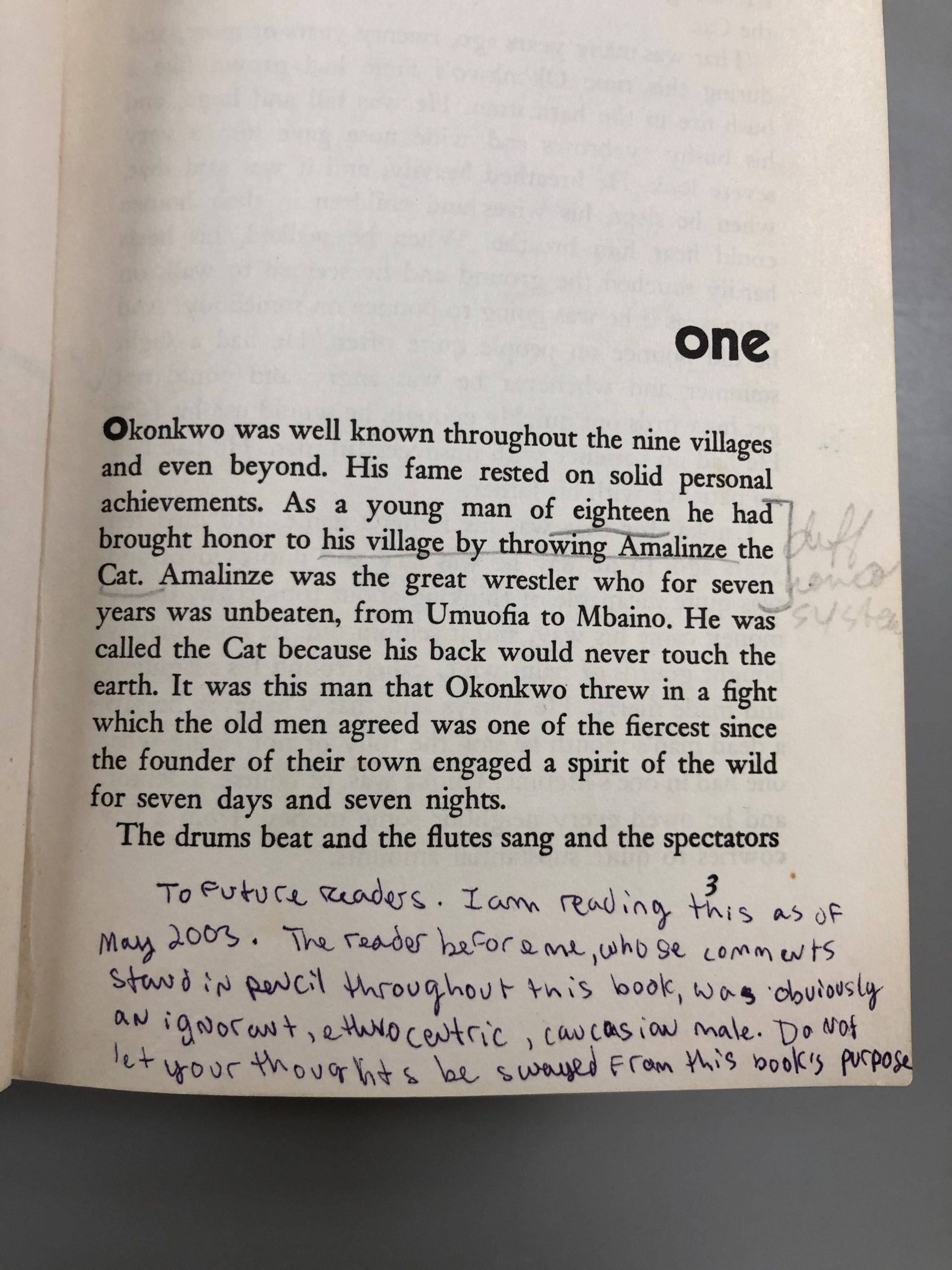 Page of book with marginalia in ink, warning about the marginalia in pencil.