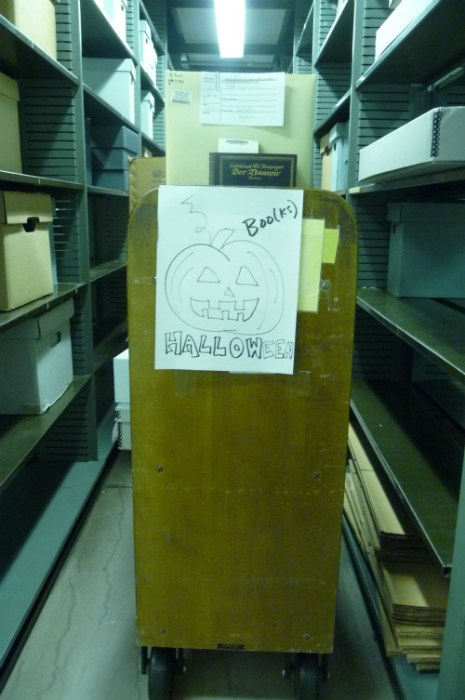 Book truck of Rubenstein Library materials for Haunted Library Screamfest