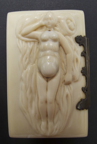 An ivory anatomical model carved into the lid of a hinged box