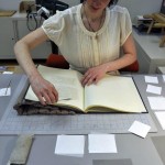 Rachel Penniman working on one of the Trent Collection volumes.