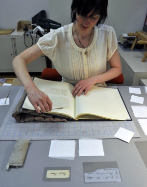 Rachel Penniman working on one of the Trent Collection volumes.