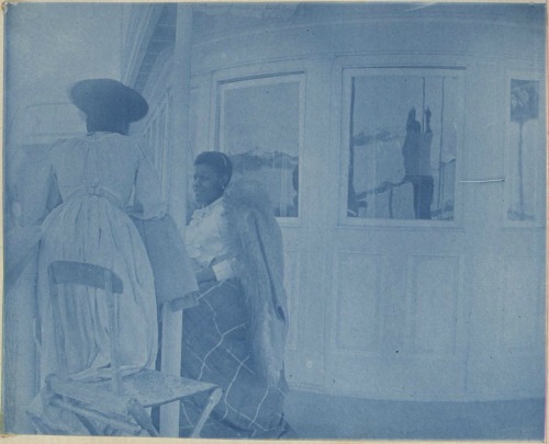 African American women aboard a steamboat, from the Tidewater album, ca. 1900.