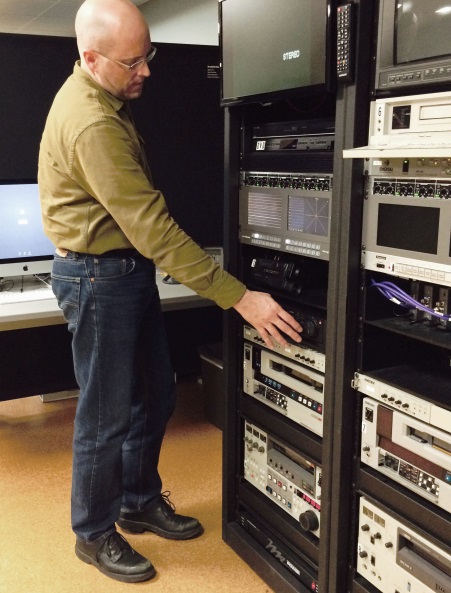 Alex Marsh operates the video deck bank. Tellingly, the digital conversion decks are made by the ‘Blackmagic’ company
