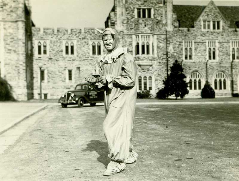 The Duke Blue Devil in a clown-like costume, ca. 1930s