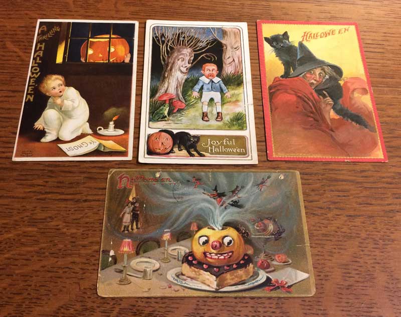 Photo of four Halloween postcards