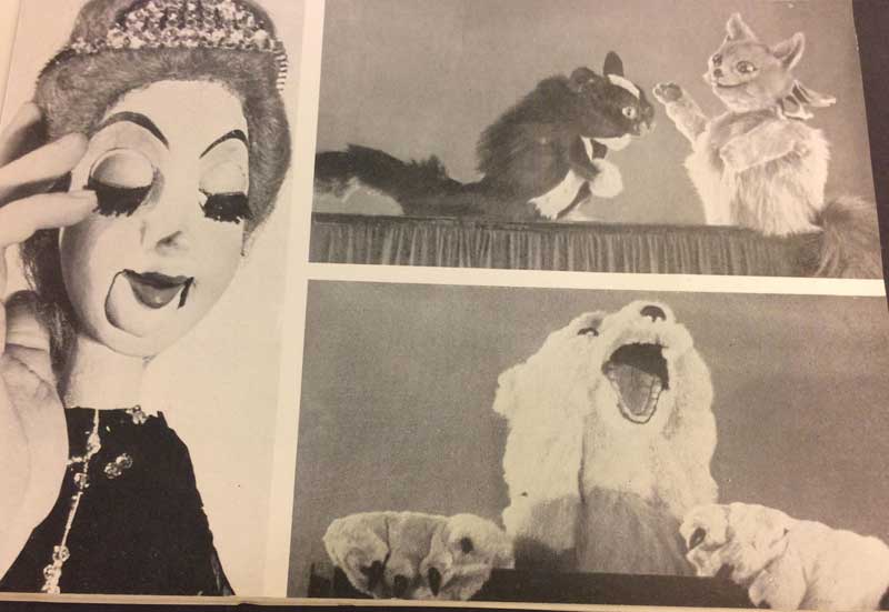 Photo of a page from “Puppets and the Puppet Theater" showing puppets.