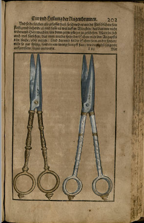 Color photo of illustration from Ophthalmodouleia, das ist Augendienst showing a pair of scissors highlighted in gold and silver.
