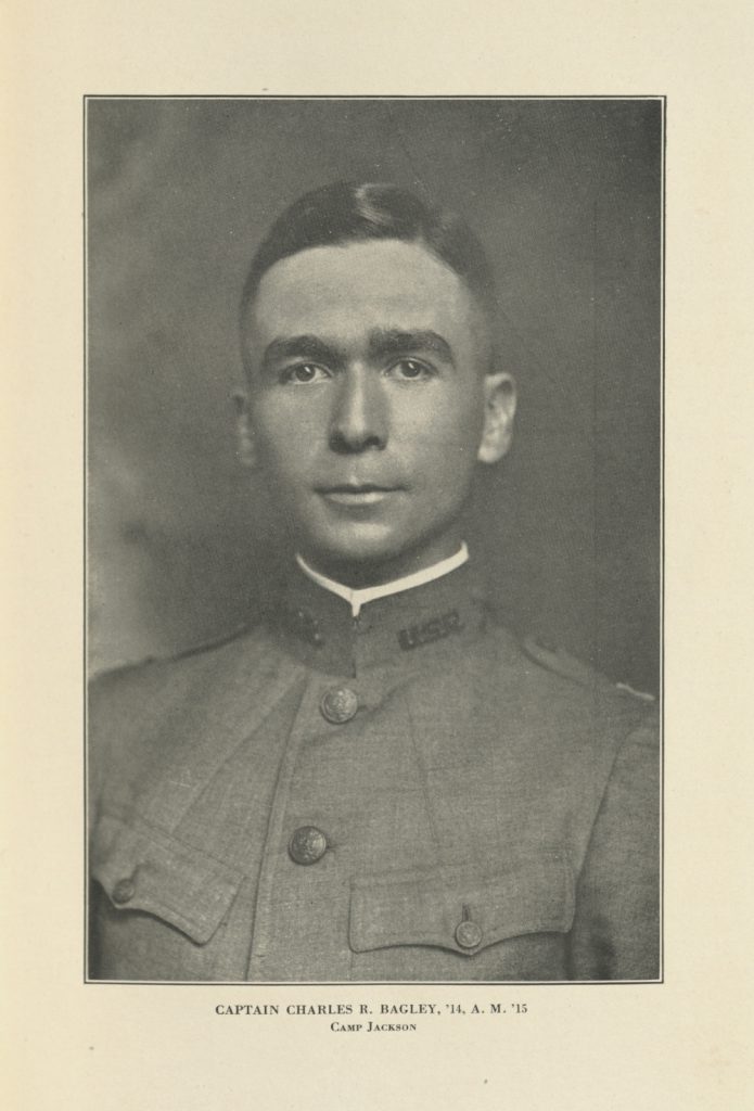 scan of a page of a book. the only thing on the page is a black and white photograph of a young white man in a military uniform. His hair is cut short, he doesn't have any facial hair, and he is looking directly at the camera. 