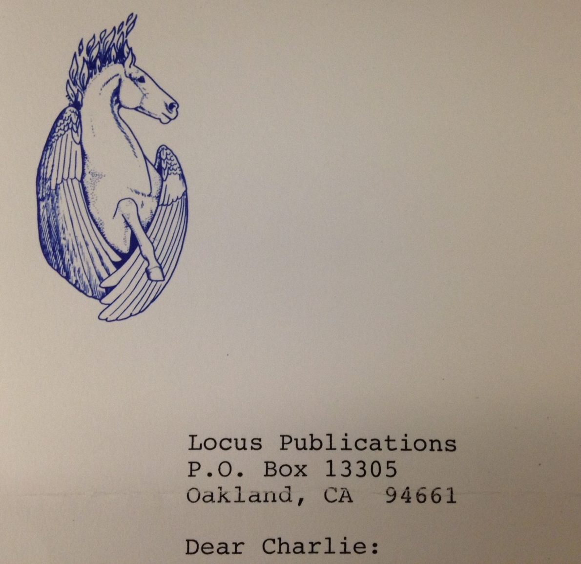 Winged horse with a flaming mane printed on stationary.