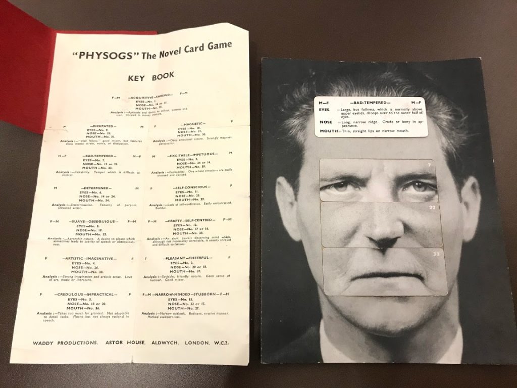 Photograph of the game's key book and a completed card
