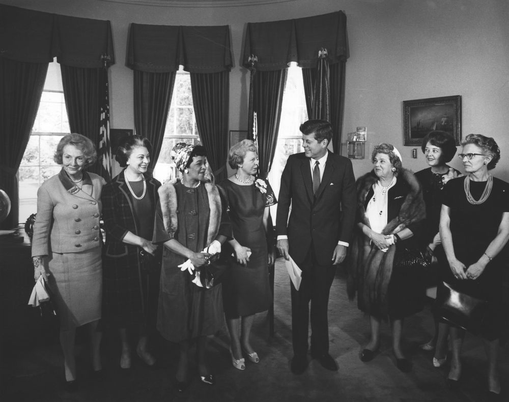 President John F. Kennedy with the recipients of the 1963 Federal Woman’s Award for outstanding contributions to government. Eleanor Pressly is second from the right. Photo from the John F. Kennedy Presidential Library and Museum.