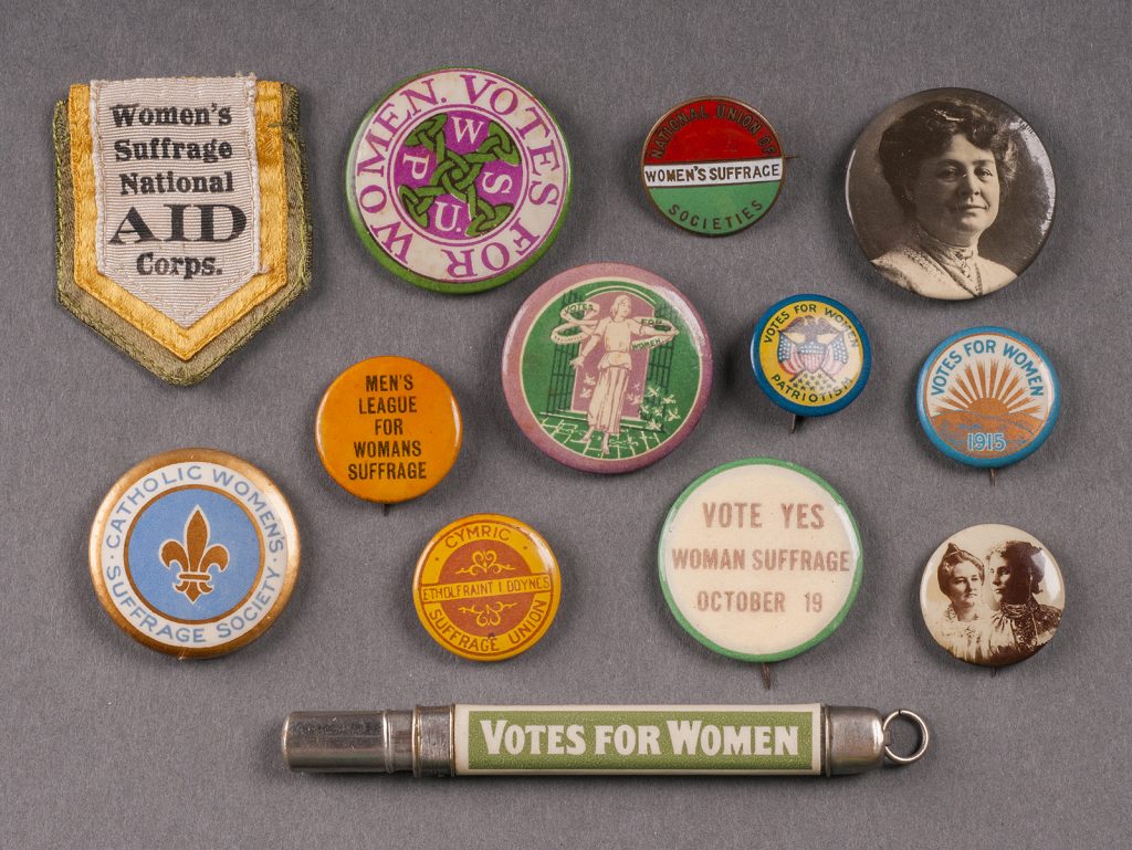 Array of buttons promoting women's suffrage