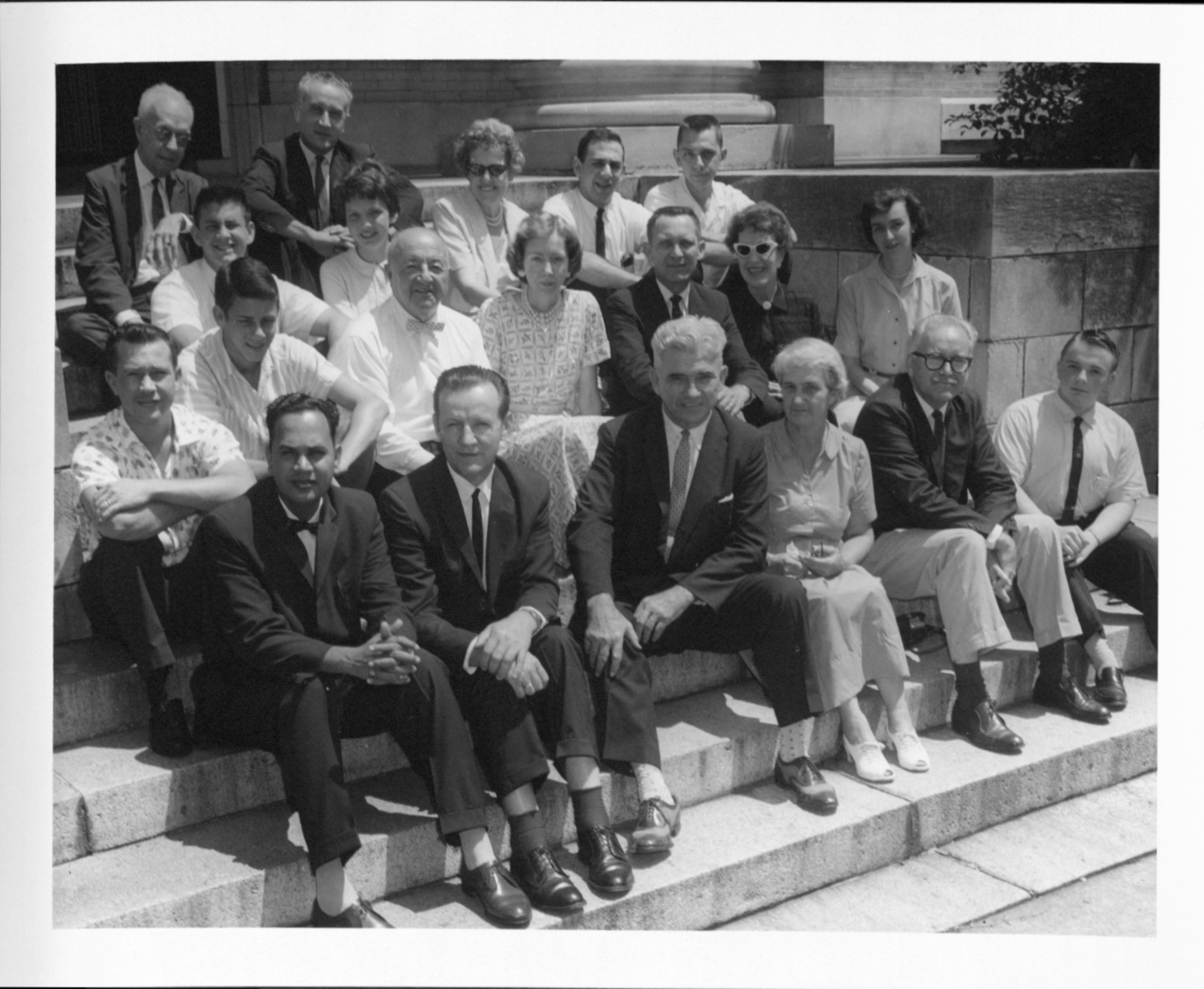 People from the Parapsychology Lab sitting on steps