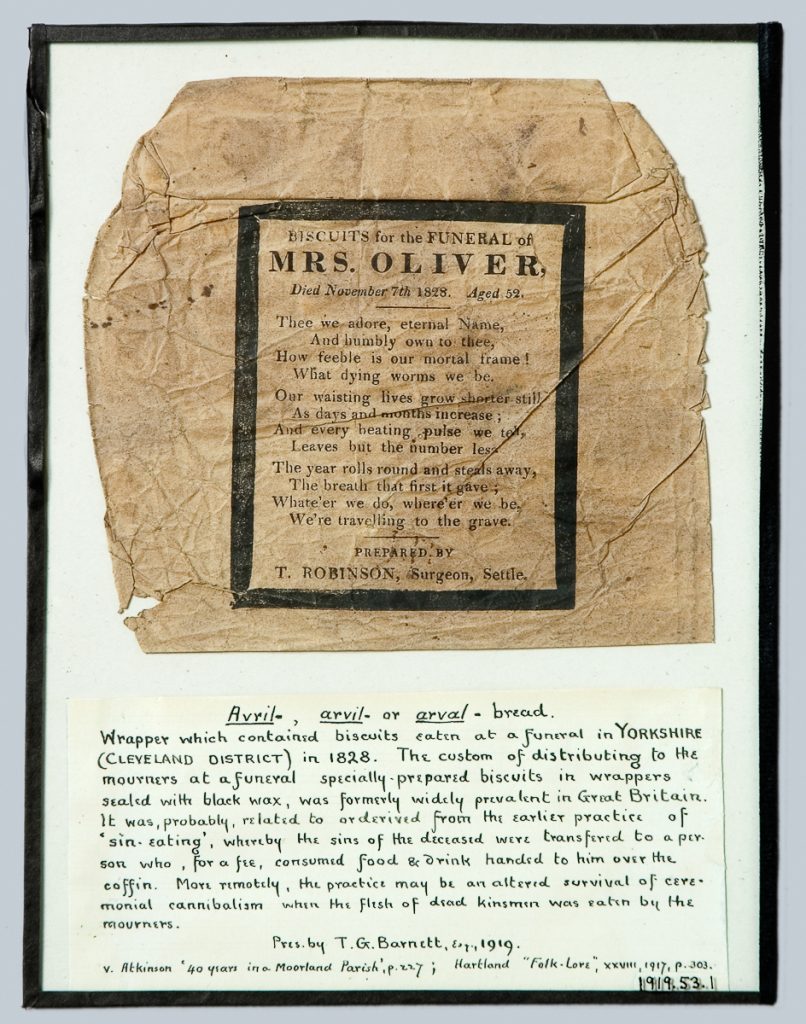 Brown paper biscuit wrapper with text from the funeral of Mrs. Oliver. 