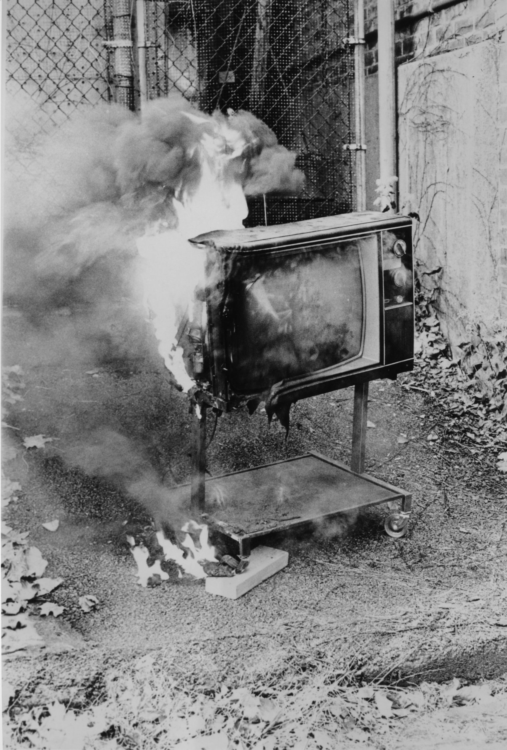 image showing television set on fire