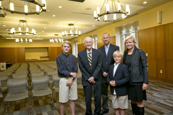 The Holsti family pose for a portrait in the Holsti Anderson Assembly Room.