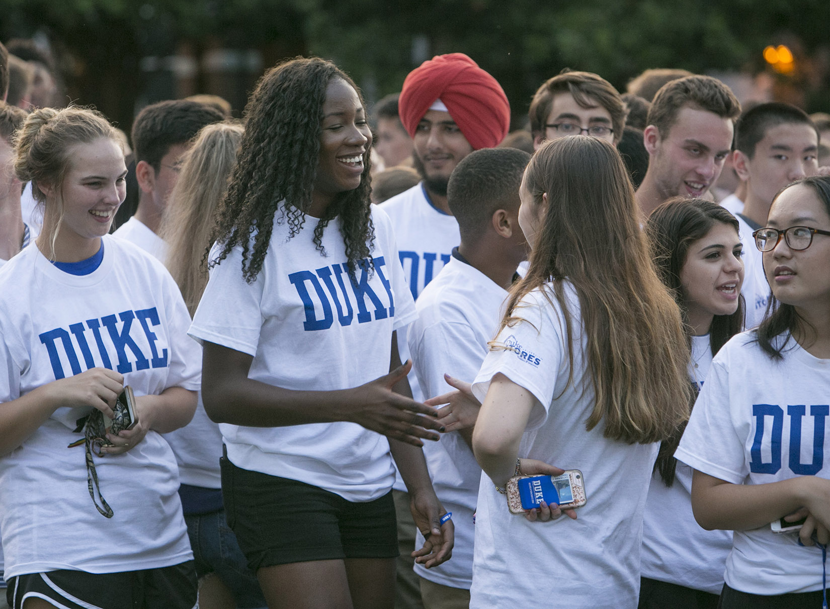 First-year students make friends during the class photo shoot in front of Lilly Library on East Campus. Photo by Jared Lazarus.