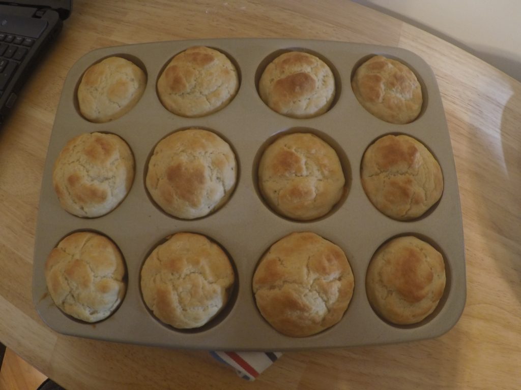 Image of fully baked muffins in a metal muffin pan